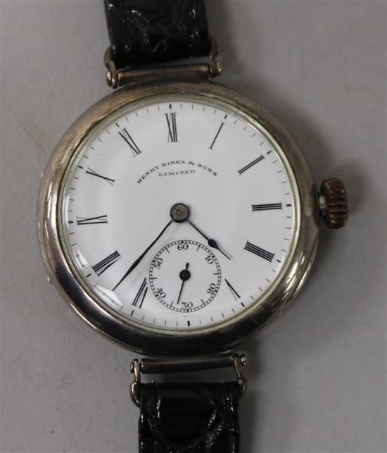 A gentlemans early 20th century silver manual wind wrist watch, retailed by Henry Birks & Sons.